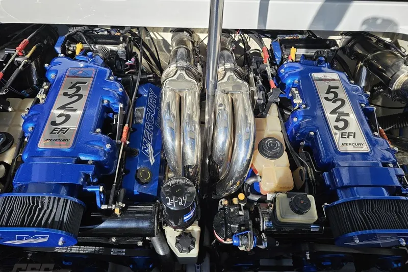 Slide: The Image of Twin Mercury 525 EFI engines in a 2009 Formula 353 FASTech boat. - 96