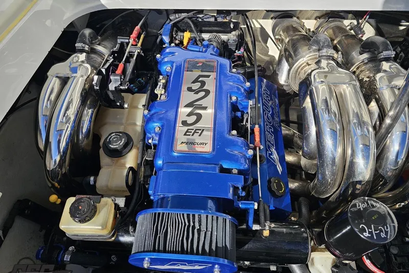 Slide: The Image of 2009 Formula 353 FASTech engine, featuring a Mercury Racing 525 EFI with chrome headers. - 97