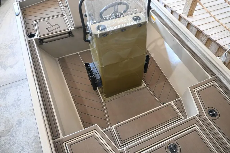 Slide: The Image of Interior of a 2026 Thor 1900 boat with sleek design and storage compartments. - 10