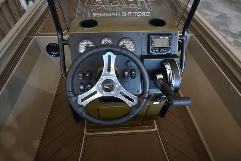 Slide: The Image of Steering console of 2026 Thor 1900 boat with gauges and controls. - 7