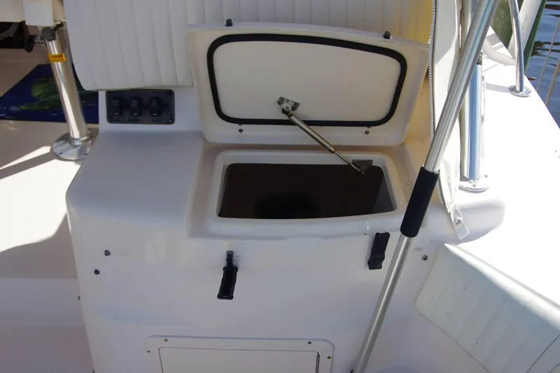 Slide: The Image of Open storage compartment on 2010 Grady-White Express 330 boat deck. - 22