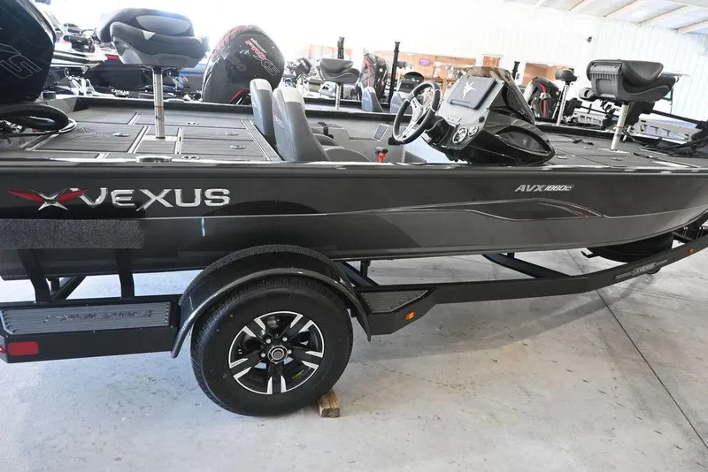 The Image of 2026 Vexus AVX 1880c boat in showroom, side view with trailer. - 0