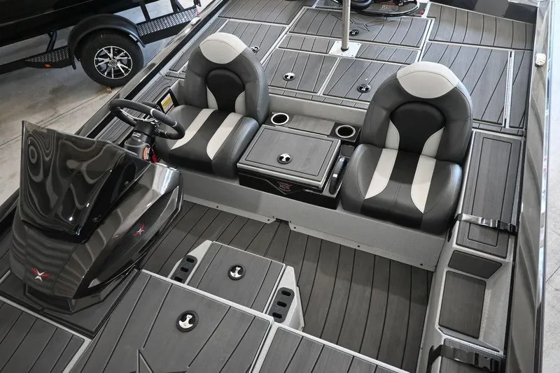 Slide: The Image of 2026 Vexus AVX 1880c boat interior with dual seats and modern dashboard design. - 5