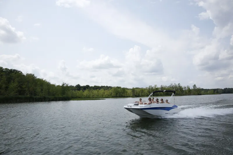 The Image of Starcraft SVX 171 OB 2026 boat cruising on a serene lake. - 0