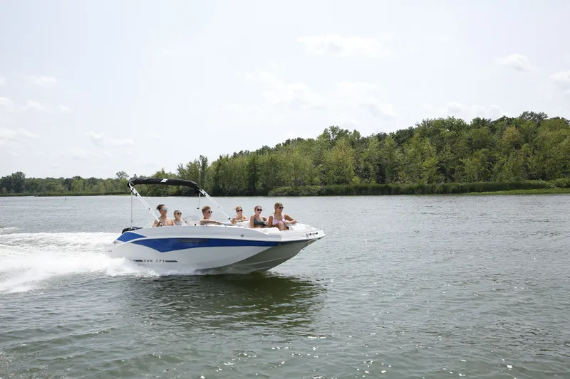 Slide: The Image of Starcraft SVX 171 OB 2026 boat cruising on a serene lake. - 2