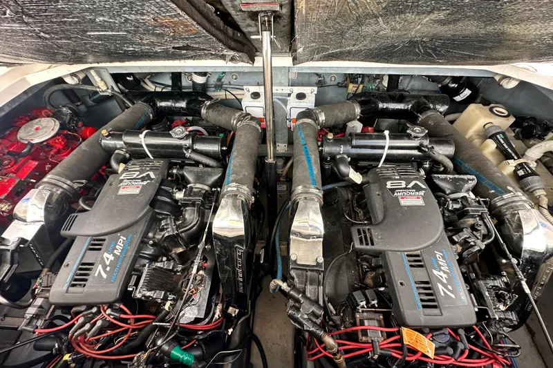 Slide: The Image of Engine compartment of a 2000 Sea Ray 340 Sundancer with twin V8 engines. - 45