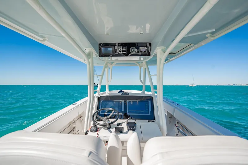 Slide: The Image of 2019 Jupiter 38 HFS boat interior with ocean view and navigation equipment. - 34