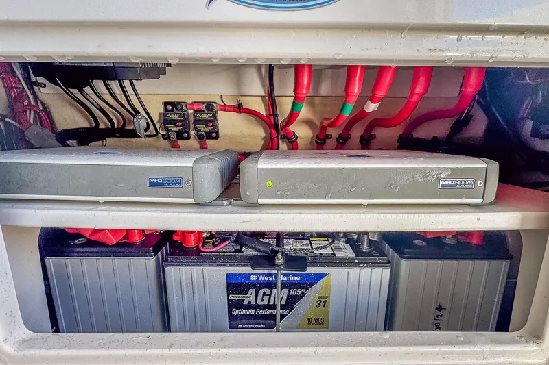 Slide: The Image of 2019 Jupiter 38 HFS boat electrical system with batteries and wiring. - 54