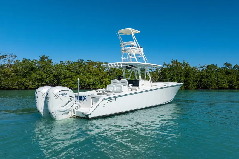 Slide: The Image of 2019 Jupiter 38 HFS boat with dual Yamaha engines on clear water. - 67