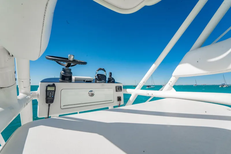 Slide: The Image of 2019 Jupiter 38 HFS boat helm with ocean view and clear blue sky. - 99