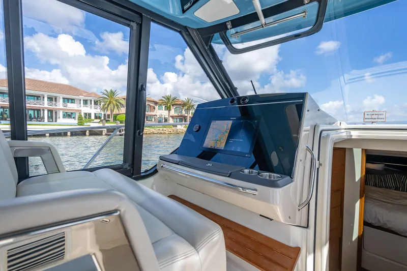 Slide: The Image of Interior view of 2021 Boston Whaler 405 Conquest boat with navigation system. - 46