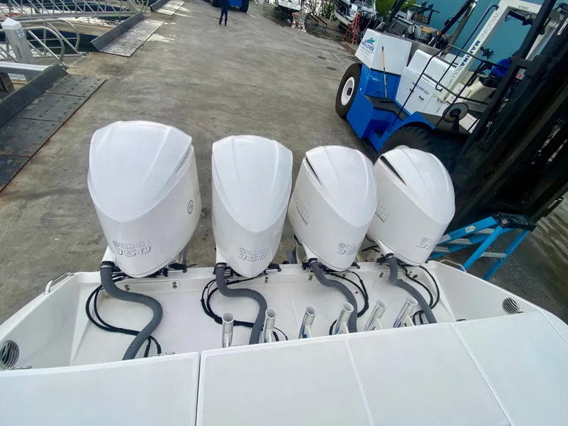 Slide: The Image of Four powerful outboard engines on a 2016 Everglades 435 Center Console boat. - 3