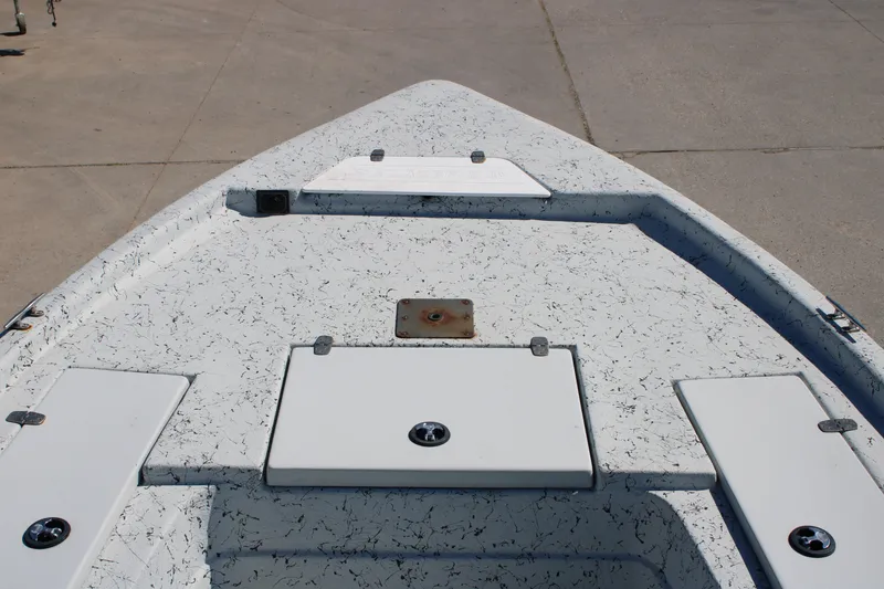 Slide: The Image of 2017 Blazer Bay 2170 boat deck with storage compartments and textured surface. - 10