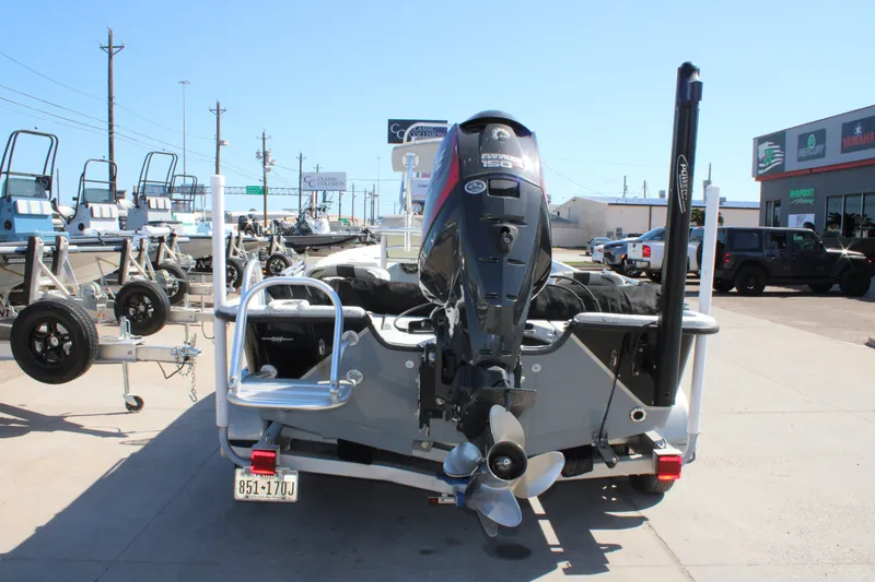 Slide: The Image of 2017 Blazer Bay 2170 boat with Evinrude motor, parked at dealership. - 6