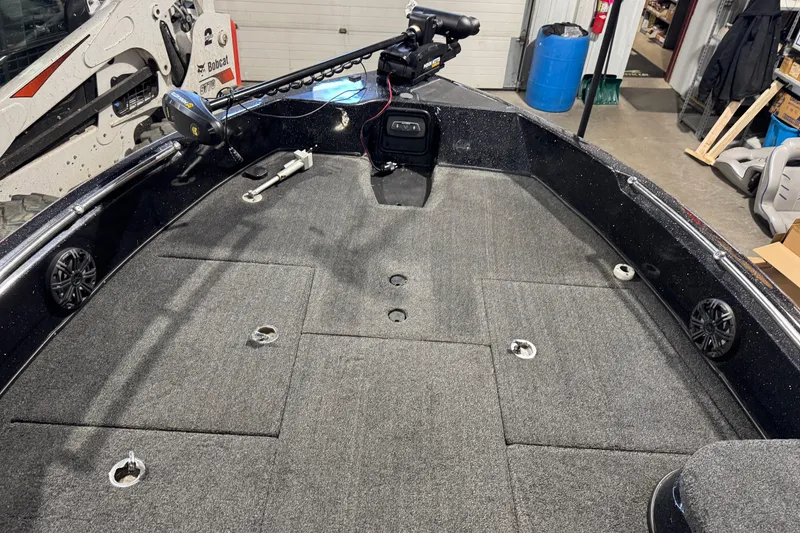 Slide: The Image of 2020 Nitro ZV21 boat interior with carpeted deck and mounted equipment. - 13