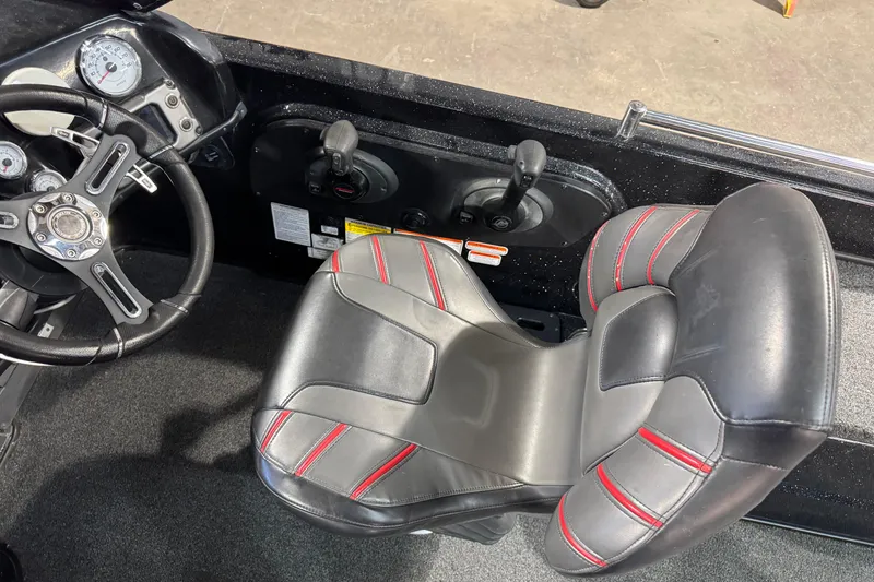 Slide: The Image of Interior of 2020 Nitro ZV21 boat with steering wheel and seat. - 6