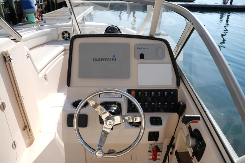 Slide: The Image of 2020 Grady-White Freedom 235 boat helm with Garmin navigation system. - 22