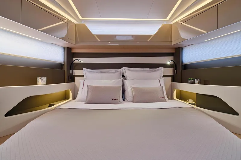 Slide: The Image of Manufacturer Provided Image: Luxurious interior cabin of 2025 Jeanneau DB/43 OB yacht with modern design and ambient lighting. - 5
