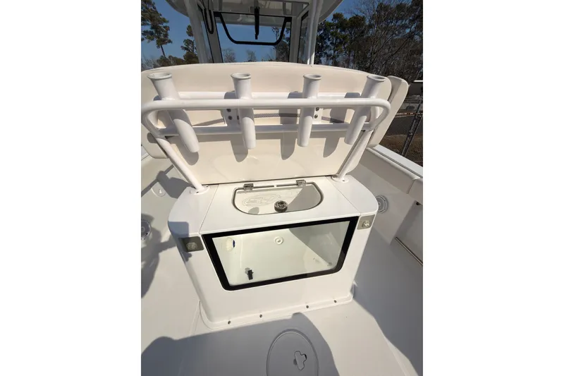 Slide: The Image of 2023 Sea Hunt Gamefish 25 boat interior with seating and storage compartments. - 11