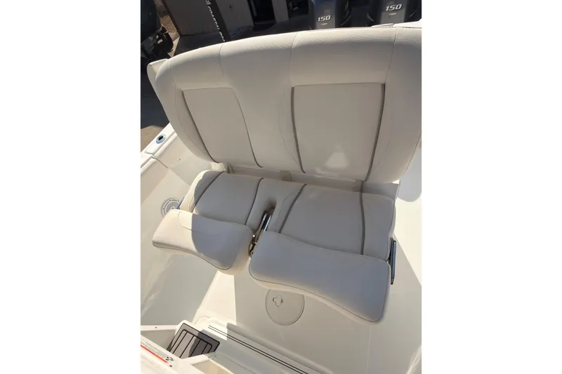 Slide: The Image of 2023 Sea Hunt Gamefish 25 boat seat, beige upholstery, dual backrest design. - 13
