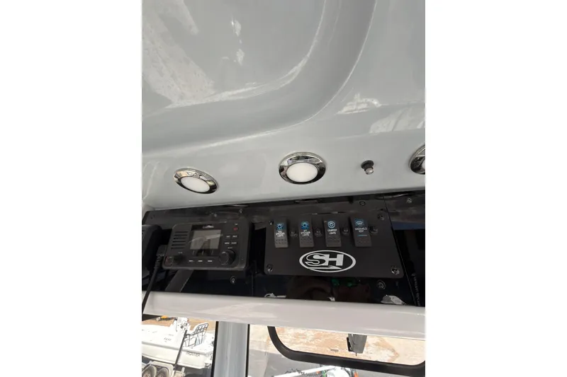 Slide: The Image of 2023 Sea Hunt Gamefish 25 boat interior storage compartment. - 22
