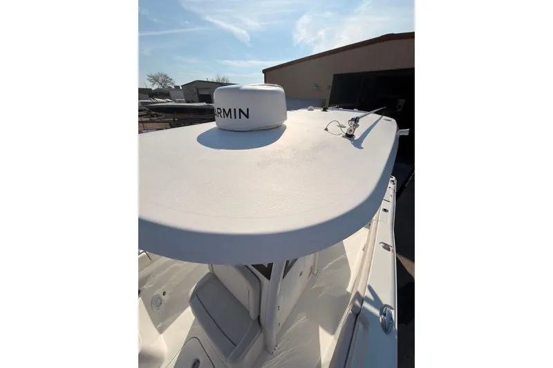 Slide: The Image of Storage compartment of 2023 Sea Hunt Gamefish 25 boat, featuring a clean, white interior. - 24