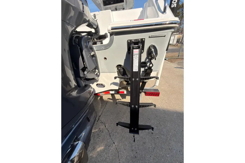 Slide: The Image of 2023 Sea Hunt Gamefish 25 boat with motor and trailer, rear view. - 36