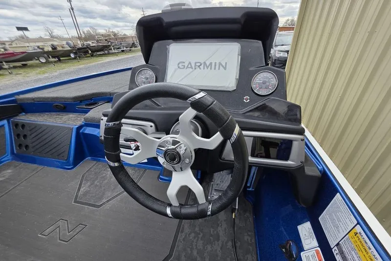 Slide: The Image of Steering console of 2026 Nitro Z20 XL Pro boat with Garmin display. - 18