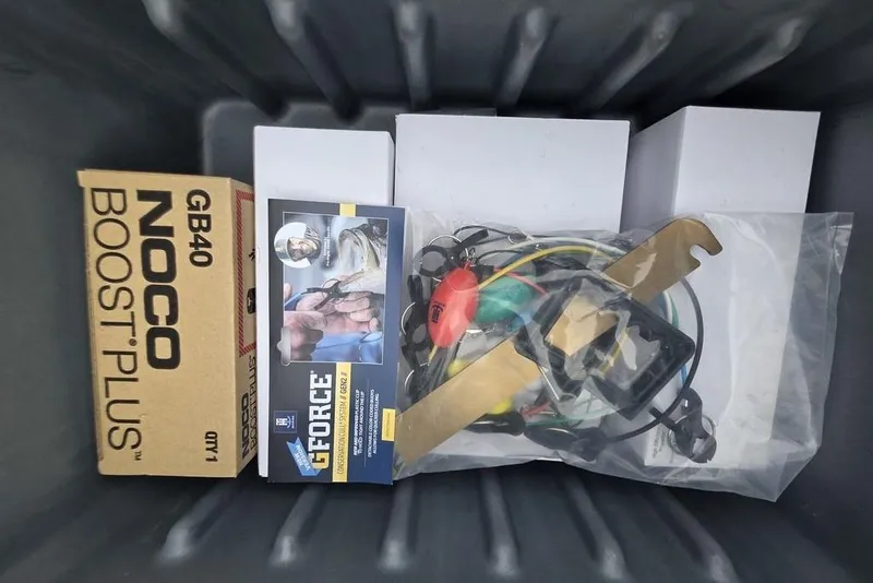 Slide: The Image of Box of NOCO Boost Plus GB40 and accessories in a container. Nitro Z20 XL Pro 2026. - 39