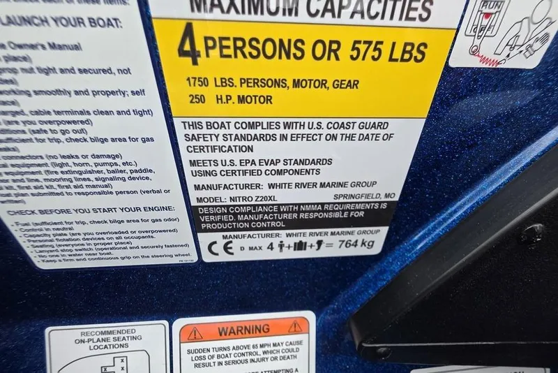 Slide: The Image of 2026 Nitro Z20 XL Pro capacity label, 4 persons or 575 lbs, 250 HP motor. - 46