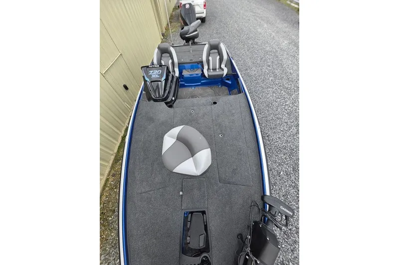 Slide: The Image of 2026 Nitro Z20 XL Pro fishing boat with gray seating and advanced navigation system. - 55