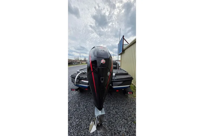 Slide: The Image of 2026 Nitro Z20 XL Pro boat with powerful outboard motor on gravel driveway. - 8