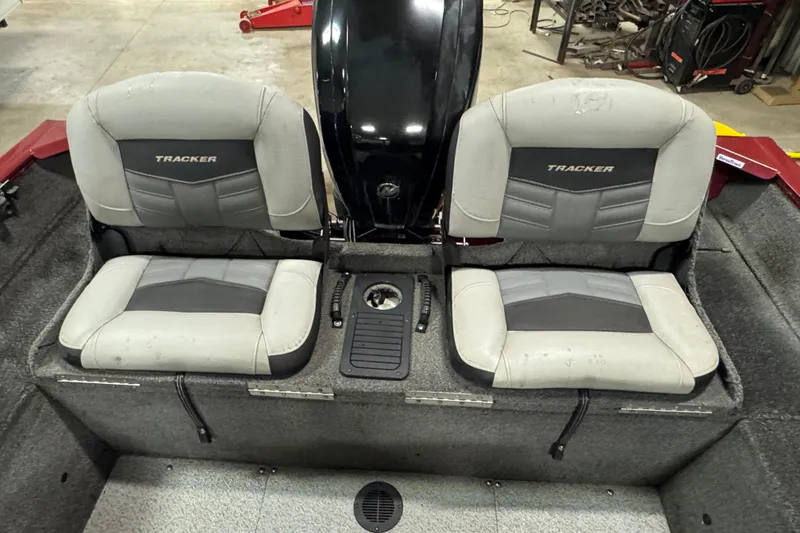 Slide: The Image of 2018 Tracker Pro Guide V-175 Combo boat seats, gray upholstery, and central console. - 6