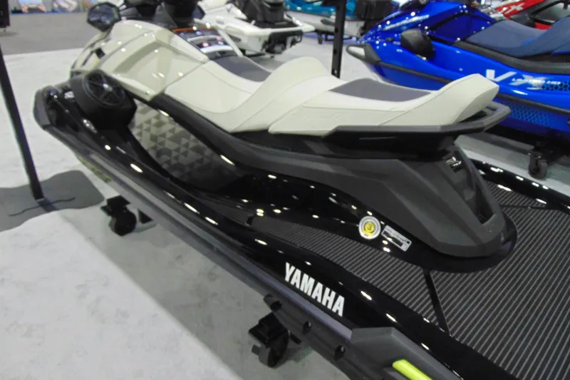 Slide: The Image of 2026 Yamaha WaveRunner VX Cruiser HO jet ski on display at a showroom. - 7