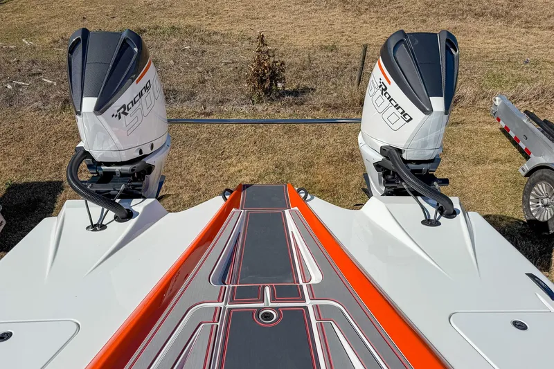 Slide: The Image of MTI 390X 2021 boat with dual Racing 300 outboard engines, sleek design. - 16