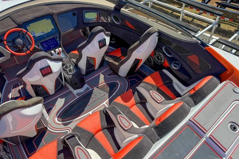 Slide: The Image of Interior of a 2021 MTI 390X boat with modern design and red accents. - 8