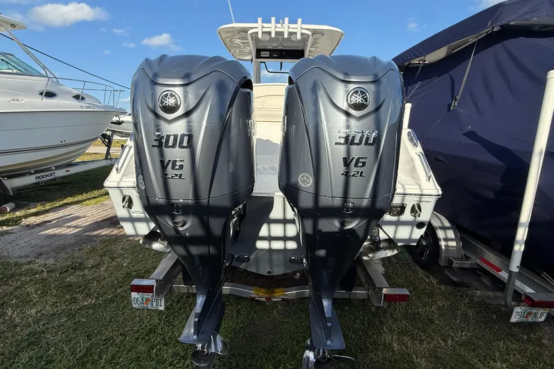Slide: The Image of 2021 Sea Hunt Ultra 305 SE with twin Yamaha 300 V6 outboard engines. - 10