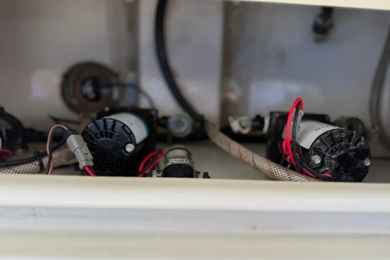 Slide: The Image of Electrical components inside a 2021 Sea Hunt Ultra 305 SE boat. - 29