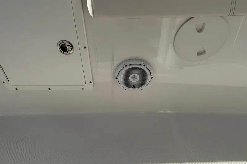 Slide: The Image of Ceiling view of 2021 Sea Hunt Ultra 305 SE boat with speaker and hatch. - 36