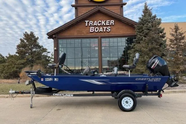 The Image of 2021 Crestliner 1700 Storm boat on trailer outside Tracker Boats store. - 1