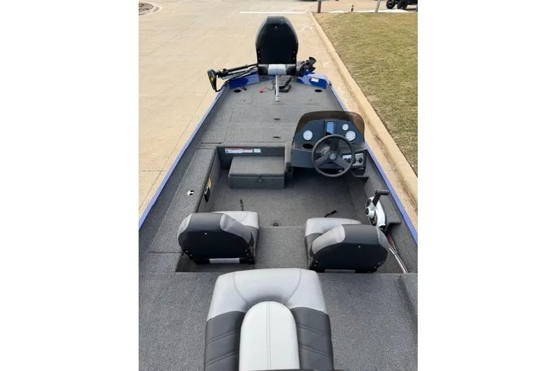 Slide: The Image of 2021 Crestliner 1700 Storm boat interior with steering console and seating. - 4