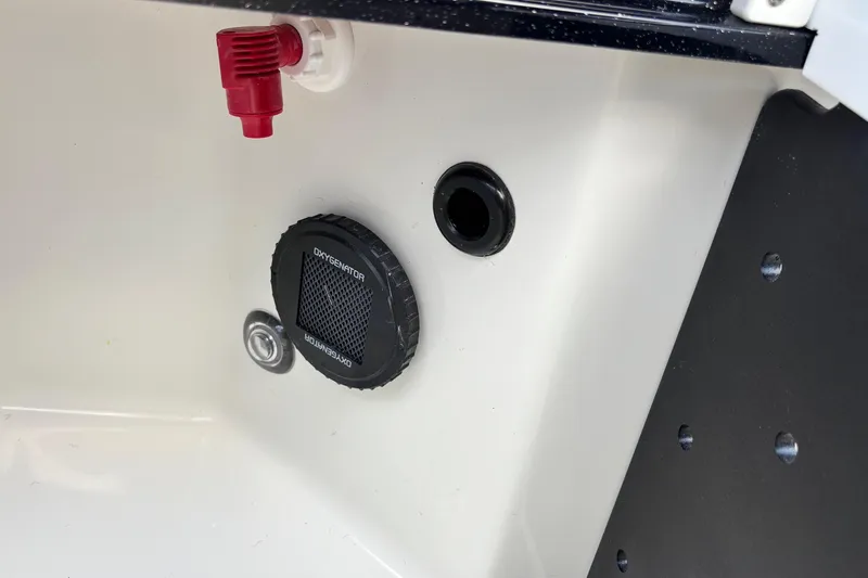 Slide: The Image of Close-up of 2026 Ranger Z520R boat's oxygenator and valve system. - 15