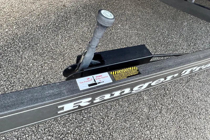 Slide: The Image of 2026 Ranger Z520R trailer brake lever on textured surface. - 3