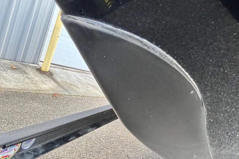 Slide: The Image of Close-up of 2026 Ranger Z520R boat hull detail in a garage setting. - 4