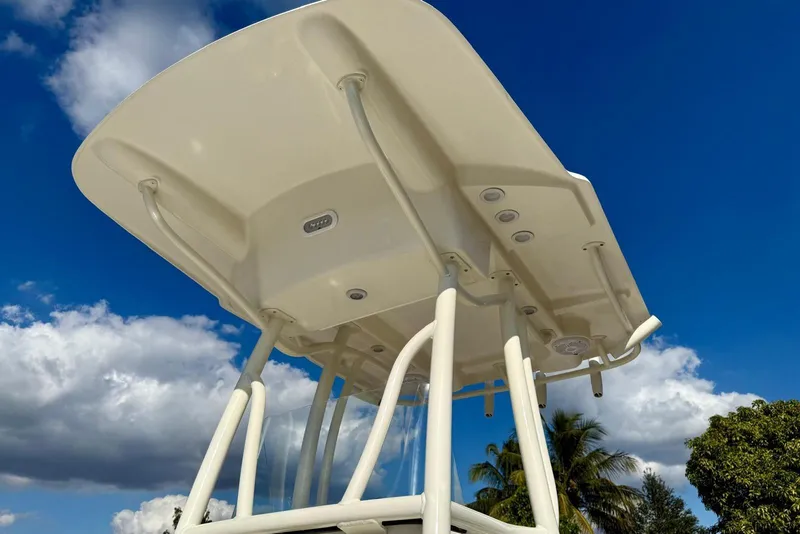Slide: The Image of 2017 Seaborn FX24 Bay boat canopy against a vibrant blue sky. - 14