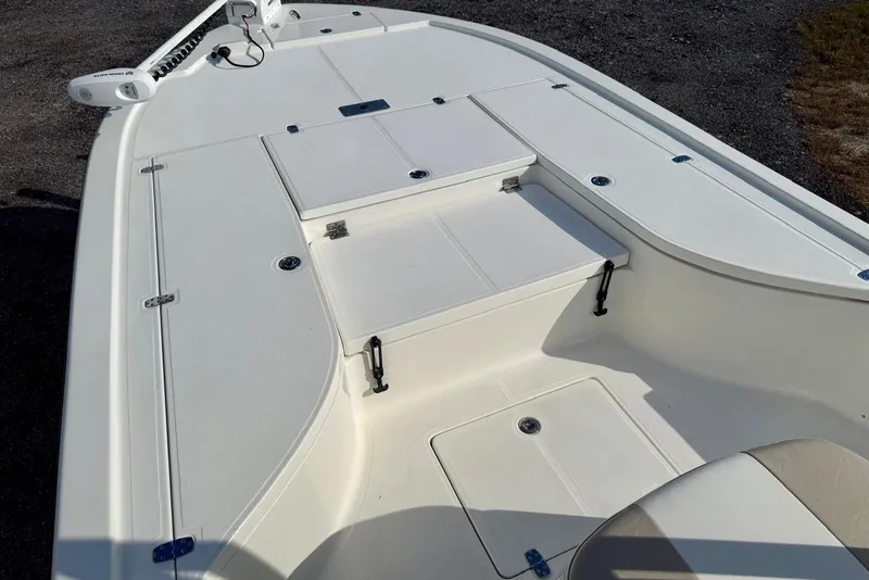 Slide: The Image of 2017 Seaborn FX24 Bay boat deck with storage compartments and seating. - 20