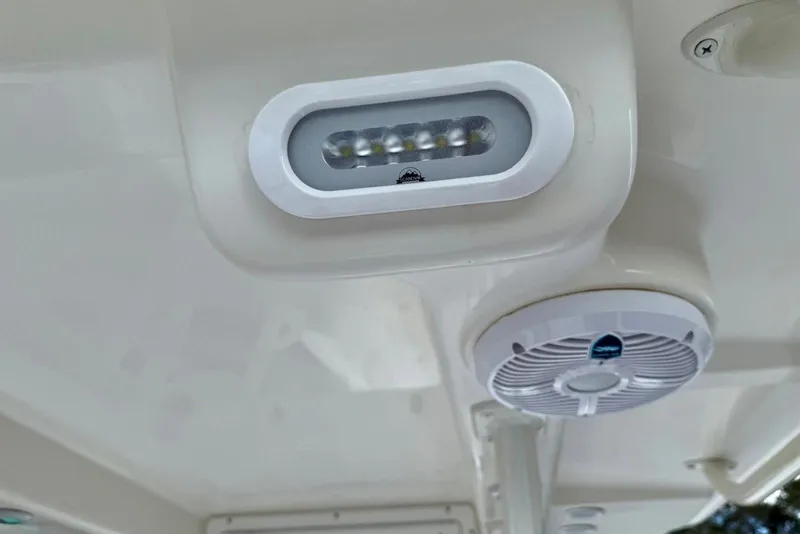 Slide: The Image of LED light and speaker on 2017 Seaborn FX24 Bay boat ceiling. - 26