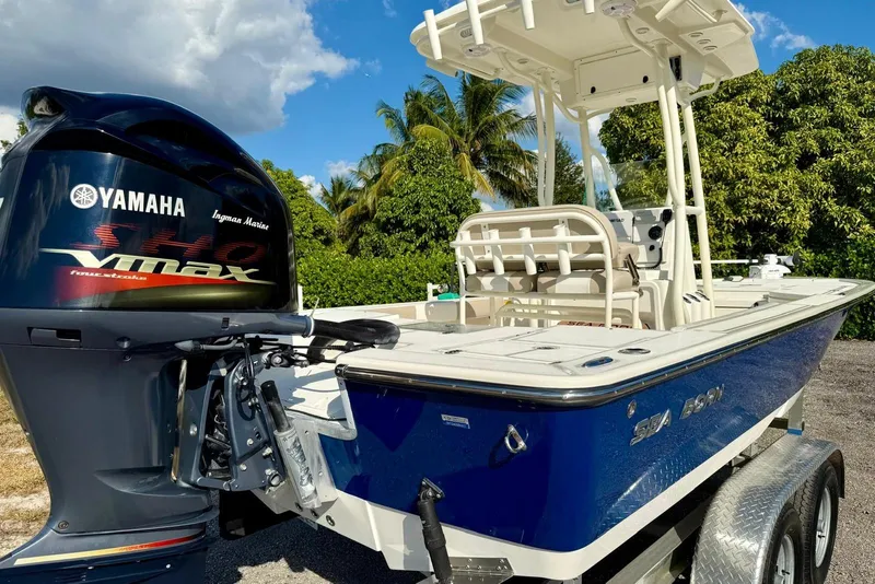 Slide: The Image of 2017 Seaborn FX24 Bay boat with Yamaha VMAX engine, parked outdoors. - 30