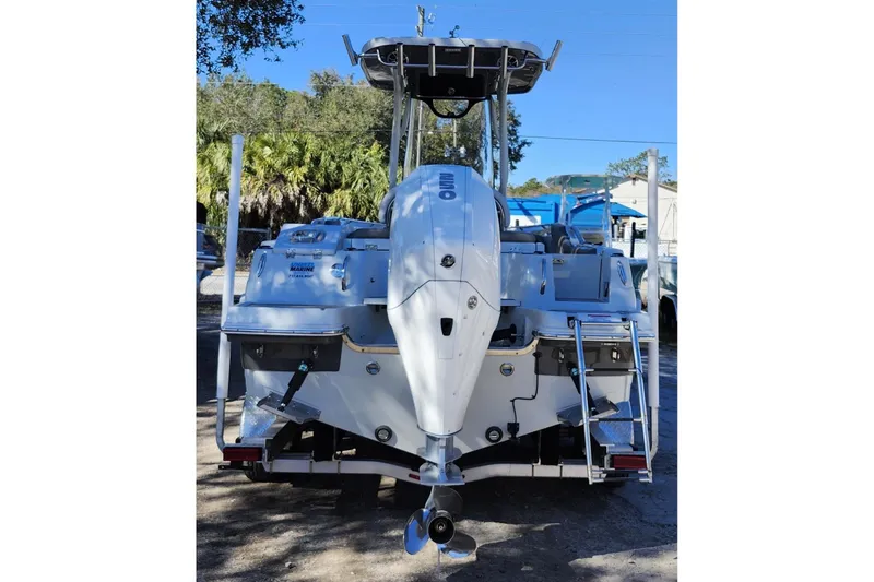 Slide: The Image of 2022 Finseeker 230 CC boat, rear view with outboard motor and ladder. - 3