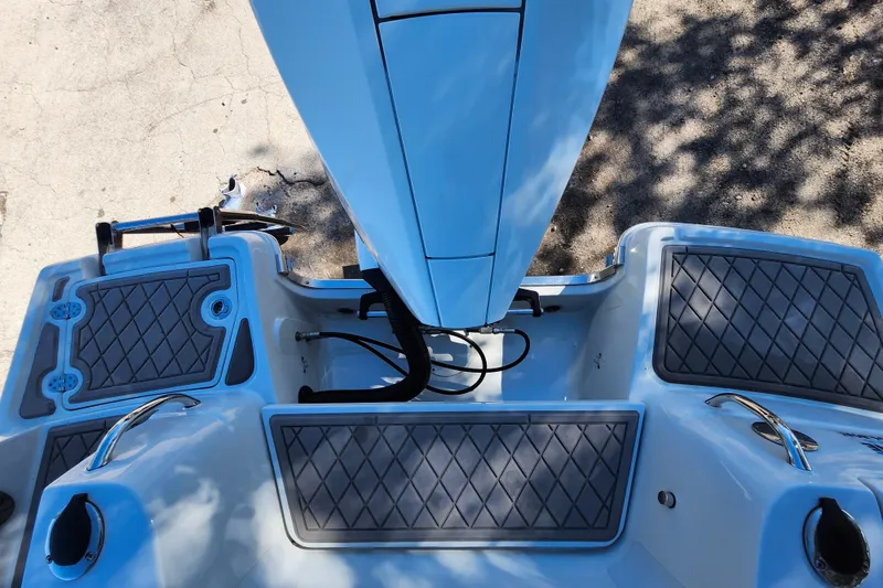 Slide: The Image of Overhead view of 2022 Finseeker 230 CC boat deck with textured flooring. - 40